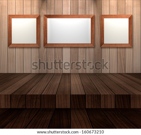 Empty photo frames on the wall