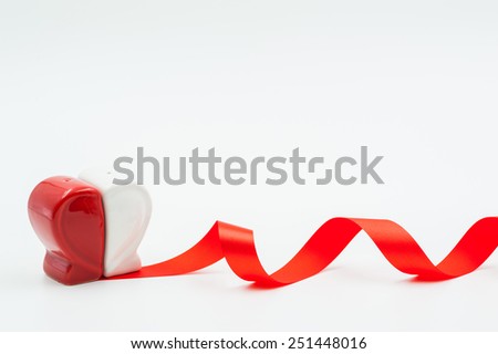 Ceramic heart - red and white background