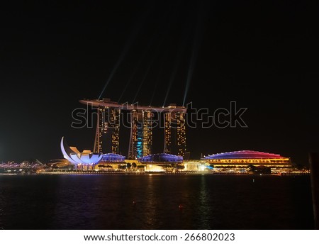 Singapore City, Singapore - June 21, 2014: Marina Bay Sands Hotel Light Show at night.