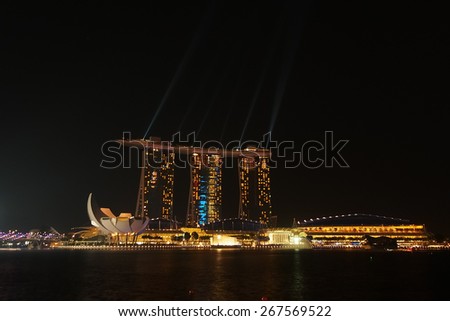 Singapore City, Singapore - June 21, 2014: Marina Bay Sands Hotel Light Show at night.
