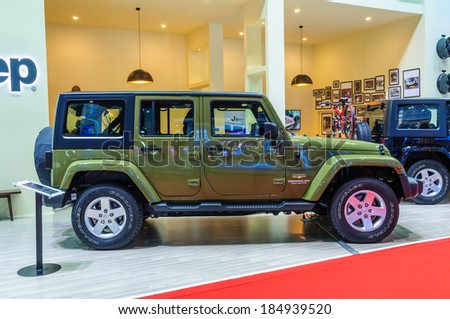 NONTHABURI, THAILAND - MARCH 31: The Jeep Wrangler Sahara is on display at the 35th Bangkok International Motor Show 2014 on March 31, 2014 in Nonthaburi, Thailand.