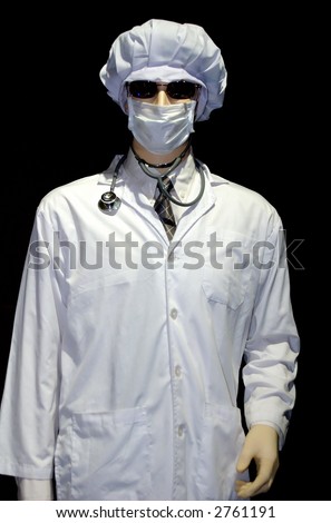 Plastic Doctor Model wearing lab coat over black background.