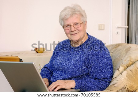 older woman working on laptop