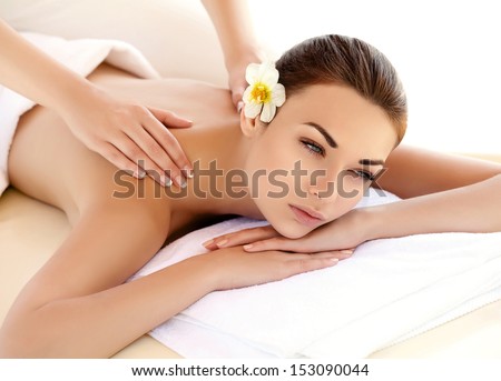 Spa Woman. Close-up of a Beautiful Woman Getting Spa Treatment. Massage