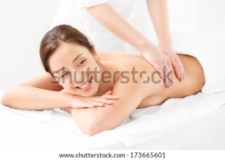 Massage. Close-up of a Beautiful Woman Getting Spa Treatment in Spa Salon