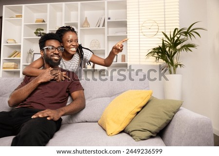 Similar – Image, Stock Photo Diverse couple chilling on floats