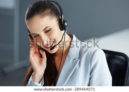 Call Center Operator Sitting Infront of Her Computer