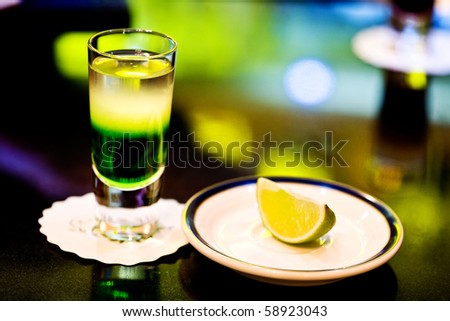 Cocktail  with lemon on the bar