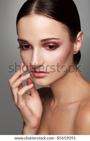 close up photo of beautiful woman\'s face with makeup