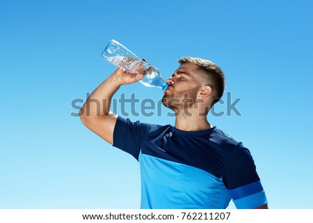 Similar – Image, Stock Photo Man in sportswear resting at stadium seat and use smartphone