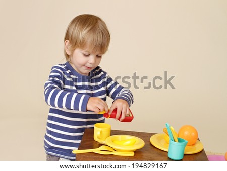 Child, cooking and playing with pretend food