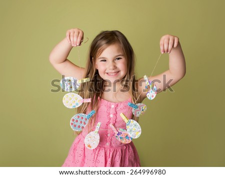 Child with Easter activities and crafts with bunny stickers, Easter Egg shapes in a banner
