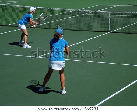 Tennis doubles match - team players