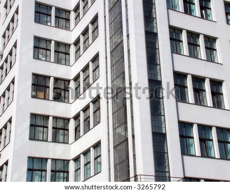 Detail of a contemporary building, clean white walls and office windows