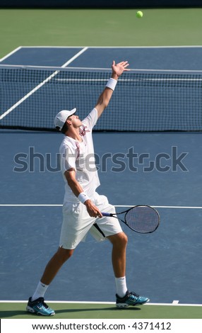 Unique shot of John Isner, a rising pro tennis star, serving at Leggmason 2007. It was his first big pro tournament where he got defeated in the final by Andy Roddick. He defeated Haas and Henman.
