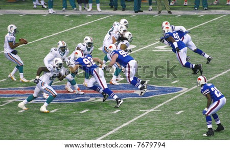 Miami Dolphins Defense protecting the quarterback against Buffalo Bills at Ralph Wilson Stadium, December 9, 2007