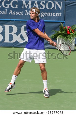 Tennis Backhand - Peter Polansky of Canada playing in a qualifying round of the Leggmason Classic Tournament of the US Open Series, August 9, 2008