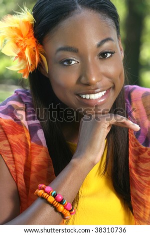 African American Young Woman Face: Smiling and happy