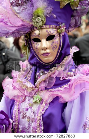 VENICE, ITALY - FEB 28: Unidentified person in carnival costume poses at Venice carnival on Feb 28, 2011 in Venice. Venice is one of the world\'s top places to celebrate carnival.