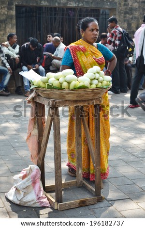 Mumbai, India - NOV 25: woman selling vegetables in the street on November 25, 2012 in Mumbai, India.
