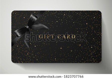 Sparkle gold stars on black gift card.  Template with twinkling elements and bow (ribbon) for shopping card (loyalty card), voucher, gift coupon. holiday invite design