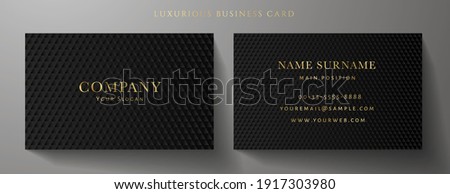 Business card with luxury abstract black triangle pattern (carbon texture). Formal premium background template useful for invitation design, Gift card, voucher or gift coupon, VIP invite