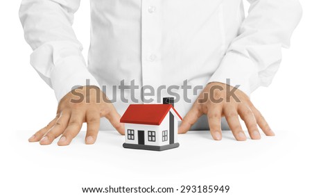 Real estate agent with house model -Concept of deal and real estate