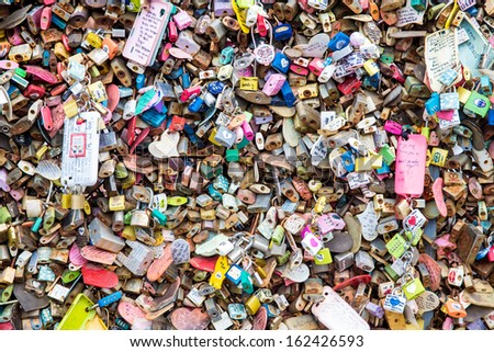 SEOUL,SOUTH KOREA - NOVEMBER 6: Plenty of master key were locked along the wall on November 6, 2013 at Seoul tower. People believe that the locked key will keep their forever love.