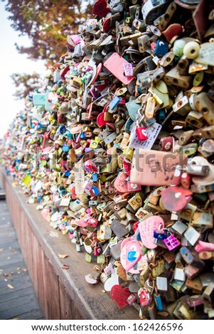SEOUL,SOUTH KOREA - NOVEMBER 6: Plenty of master key were locked along the wall on November 6, 2013 at Seoul tower. People believe that the locked key will keep their forever love.