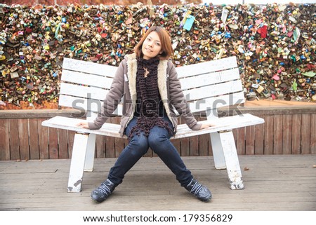 Portrait woman in background master key were locked along the wall in Seoul, Korea.
