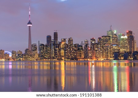 Scenic view at Toronto city waterfront skyline at twilight.