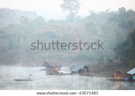 Fishing on the river, the morning mist