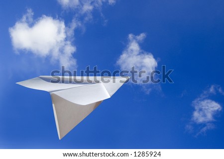 Paper Airplane Flying in the Air