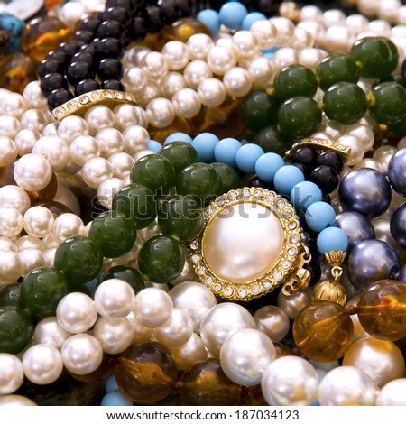 Closeup, necklaces with colored stones, jewelry, bijouteria