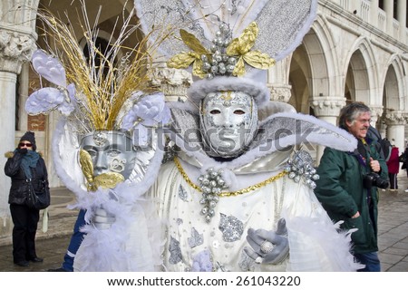 VENICE, ITALY, February 12, 2012: Carnival of Venice beautiful masks at St. Mark\'s Square