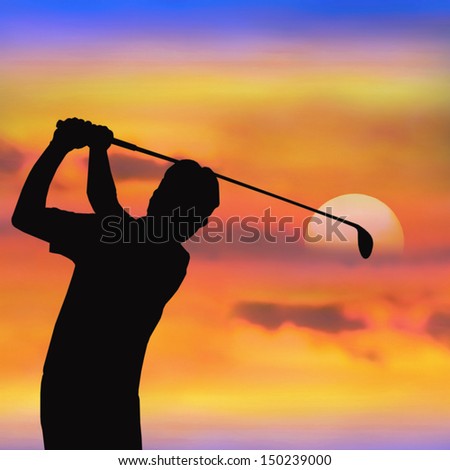 silhouette of golf player at sunset