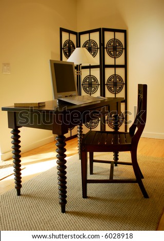 Fancy office desk and oriental screen