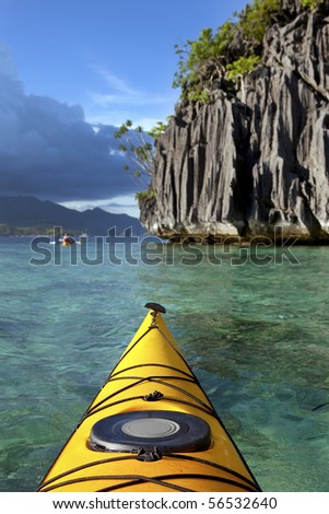 Amazing limestone rock formations and yellow sea kayak, Coron island, Philippines