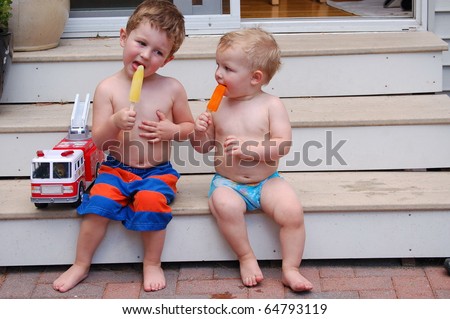 Brothers sit on step and enjoy summer treat/Enjoy the Moment/Take time to enjoy each day