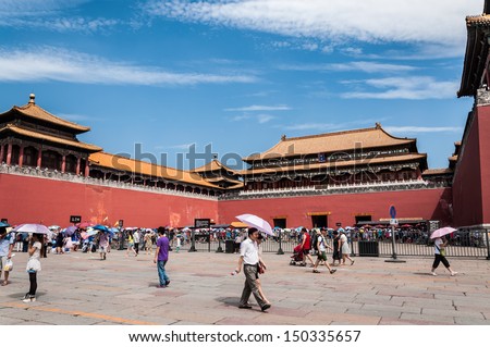 BEIJING, CHINA - JUNE 30: Tourists crowd into the Forbidden City on July 30, 2013 in Beijing, China.