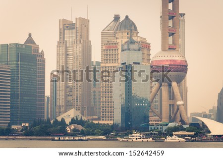 SHANGHAI, CHINA - AUGUST 1: Closeup of the Shanghai skyline as seen from across the Huangpu River on August 1, 2013 in Shanghai, China.