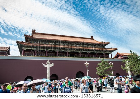 BEIJING, CHINA - JULY 30: Tourists entering into the Forbidden City on July 30, 2013 in Beijing, China.