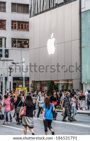 TOKYO, JAPAN - SEPTEMBER 22: Shoppers and tourists wander past a large Mac store in Ginza on September 22, 2013 in Tokyo, Japan.