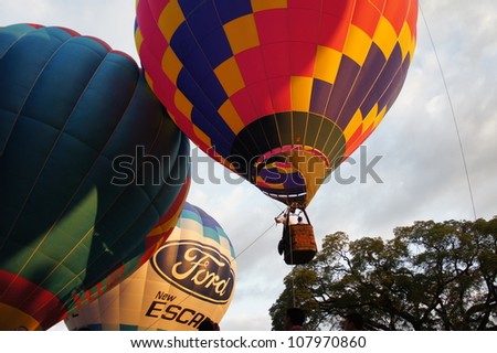 CHIANG MAI, THAILAND - NOV 25: Balloon floating to sky during Thailand international balloon festival 2011 on 25 Nov 2011 at Prince Royal\'s college in Chiang Mai