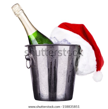ice bucket with champagne bottle and holiday decor  isolated