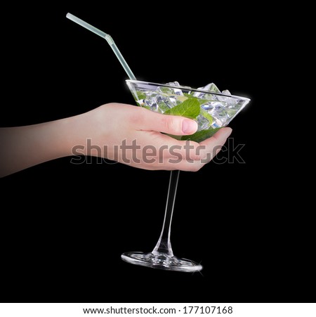 Cocktail mojito with hand making toast on black party background