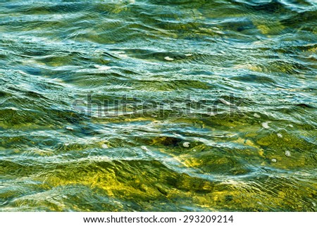 Beautiful blue and green waters with soft ripples on surface