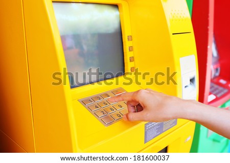 Entering atm cash machine pin code