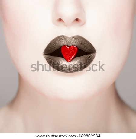 Glamour red lips with little heart