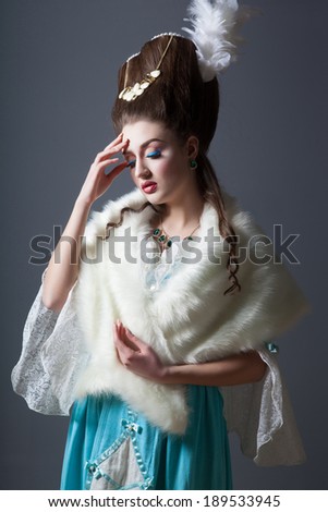 Old fashioned sexy woman with fur cape